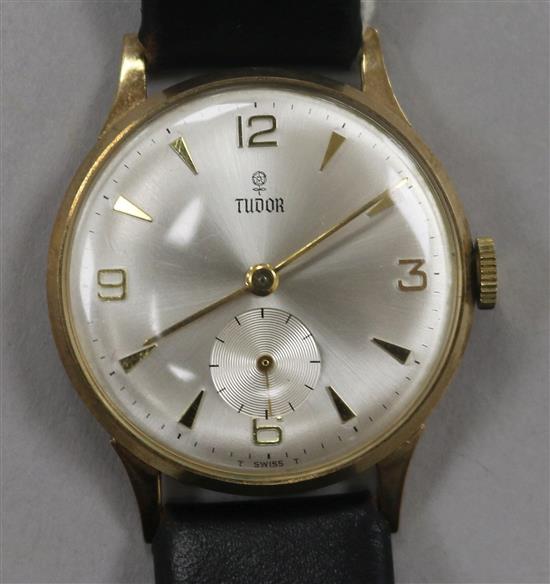 A gentlemans 1960 9ct gold Tudor manual wind wrist watch, on leather strap with Rolex buckle, with Tudor box,